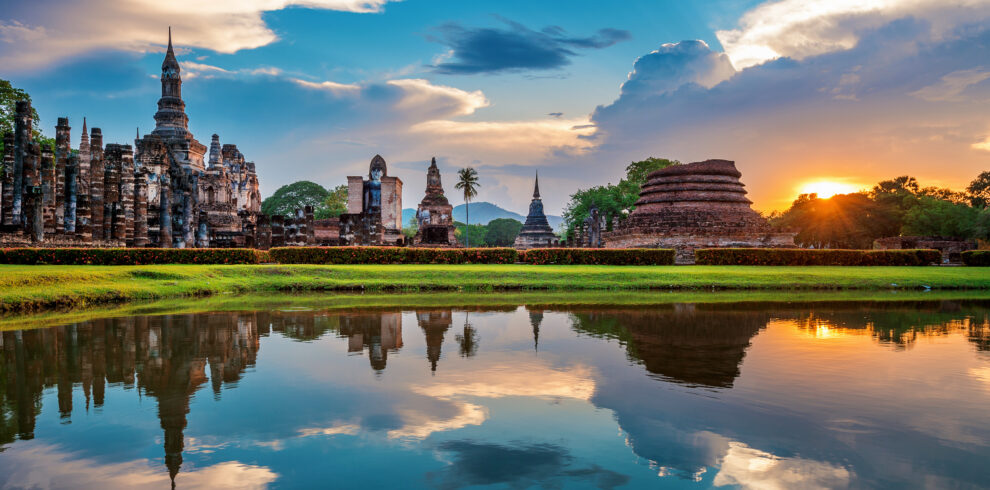 Thailand Tours & Travels - Buddha statue and Wat Mahathat Temple in the precinct of Sukhoth